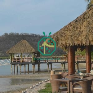 Faux palm roofing materials for beach bungalow decoration